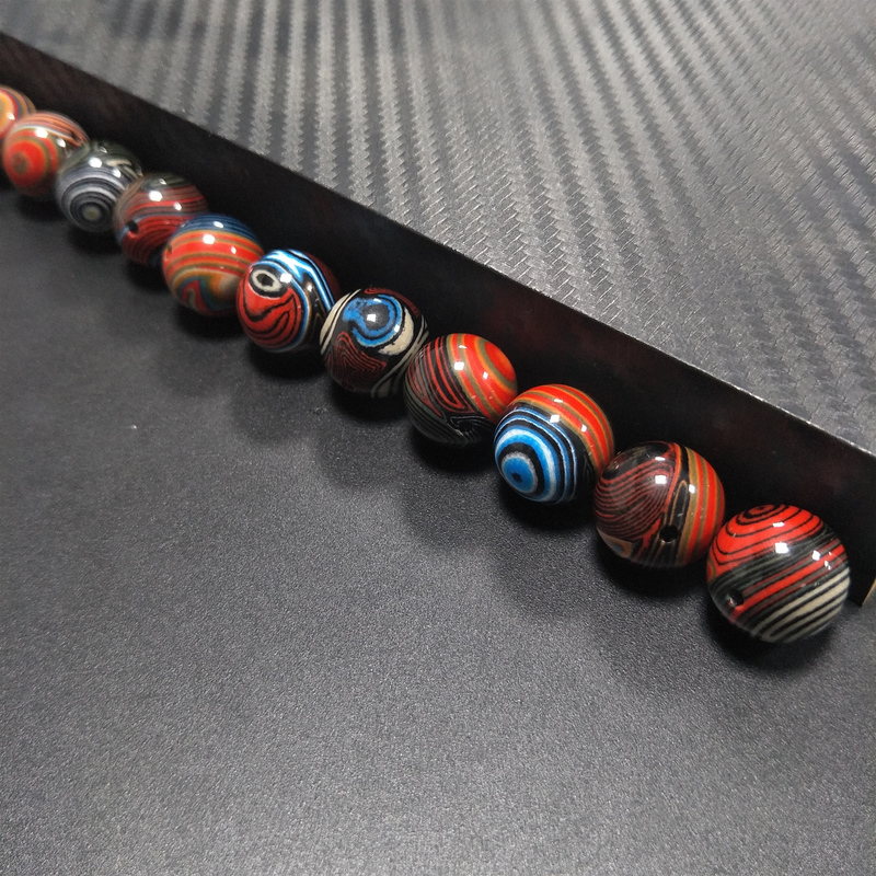 Les produits colorés de luxe de fibre de carbone d'arc-en-ciel perle les décorations uniques de boule de bracelet